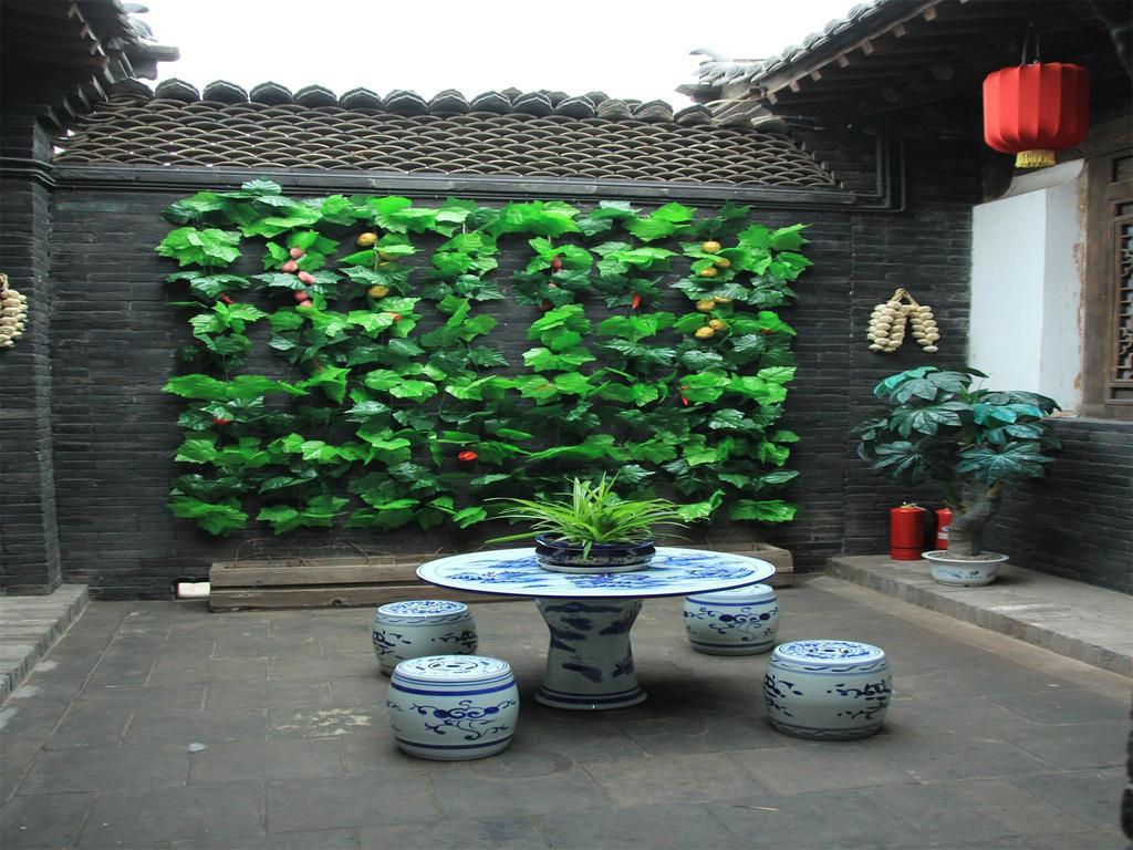 Pingyao Yiguan Folk Custom Inn Habitación foto
